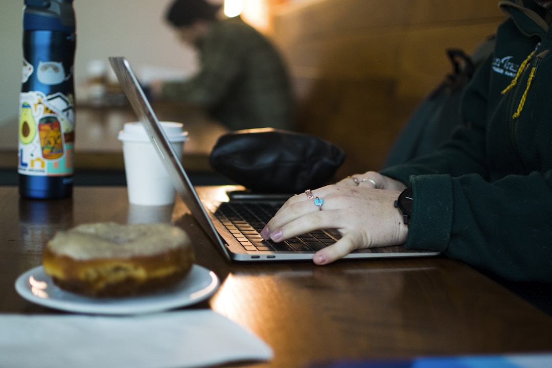 An individual using a knowledge management tool to streamline information access and enhance productivity